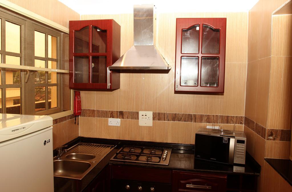 Apartment Royale Hotel & Suite Lagos Rom bilde